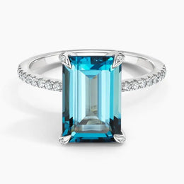 Bold gemstone ring with large center stone and statement design for eye catching look