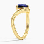 Elegant gemstone ring with blue color stone and shining white stones for luxury style