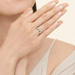 Vintage style gemstone ring with intricate detailing and sparkling stone, perfect for classic jewelry lovers