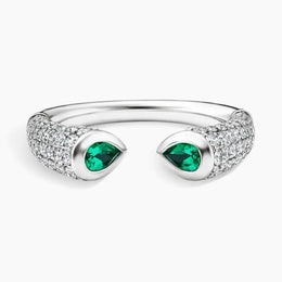 Vintage style gemstone ring with intricate detailing and sparkling stone, perfect for classic jewelry lovers