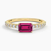 Modern gemstone ring with unique design and colorful center stone, perfect for trendy and stylish women