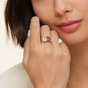 Premium gemstone ring with round cut center stone and brilliant pave set diamonds