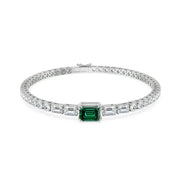 tennis bracelet with clear cubic zirconia stones in silver setting.