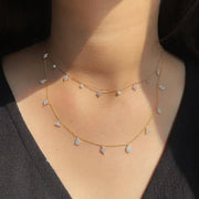 1.03 Ct Gold shell necklace pendant shaped like a seashell.