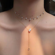 1.03 Ct Gold shell necklace pendant shaped like a seashell.