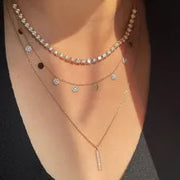 1.05 Ct Gold and turquoise necklace with blue gemstone and gold chain.