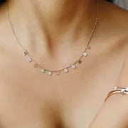 1.05 Ct Gold and turquoise necklace with blue gemstone and gold chain.