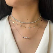 1.05 Ct Gold and turquoise necklace with blue gemstone and gold chain.