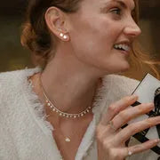 11.64 Ct Jade with gold necklace featuring green gemstone pendant.