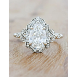Dainty engagement rings with delicate diamond elegance and refined beauty
