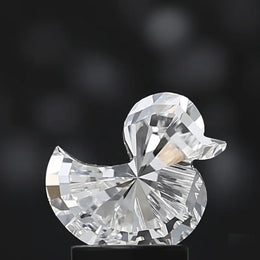 assorted lab grown diamonds including blue, pink, and yellow diamonds in jewelry, hoops, and wedding sets