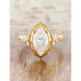 Toi et moi engagement ring with marquise diamond engagement ring style and vintage gold ring detailing.
