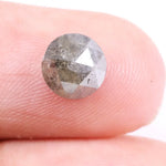 natural earth-mined diamonds including emerald cut, princess cut, round diamonds, and fancy color diamonds such as orange, pink, purple, and red