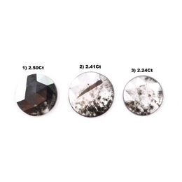 Three round rose cut lab grown salt and pepper diamonds with black and white galaxy inclusions on white background, rustic ethical conflict free loose diamonds for engagement ring or custom jewelry.