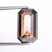 4.86 Ct emerald cut brown lab created diamond loose stone with elegant step cut for engagement or custom jewelry.