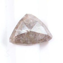 Natural pink peach diamond loose stone with deep color and bold appearance. Earth mined fancy diamond perfect for modern engagement rings.