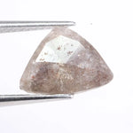 Natural pink peach diamond loose stone with deep color and bold appearance. Earth mined fancy diamond perfect for modern engagement rings.