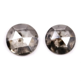 Pair of round rose cut lab grown salt and pepper diamonds with smoky gray tone and natural black inclusions, flat back faceting, matching loose stones for custom engagement rings or jewelry design.
