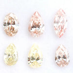 Fancy color lab grown diamonds in pear, oval and marquise shapes, CVD loose stones conflict-free diamonds for fine jewelry making and custom engagement rings.