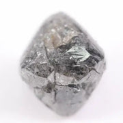 raw uncut diamond with natural rough crystal texture before cutting grey rough diamond 