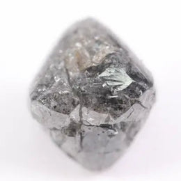 raw uncut diamond with natural rough crystal texture before cutting grey rough diamond 