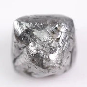 raw uncut diamond with natural rough crystal texture before cutting grey rough diamond 