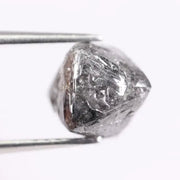 raw uncut diamond with natural rough crystal texture before cutting grey rough diamond 