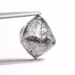 raw uncut diamond with natural rough crystal texture before cutting grey rough diamond 