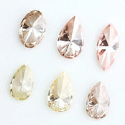 Fancy color lab grown diamonds in pear, oval and marquise shapes, CVD loose stones conflict-free diamonds for fine jewelry making and custom engagement rings.