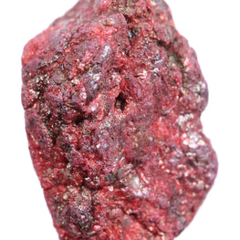 Red mineral sample on a white background
