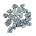 Raw rough diamonds and blue uncut raw diamond in natural unpolished rough 