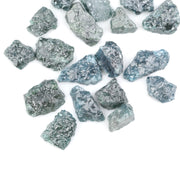 Raw rough diamonds and blue uncut raw diamond in natural unpolished rough 