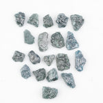 Raw rough diamonds and blue uncut raw diamond in natural unpolished rough 