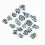 Raw rough diamonds and blue uncut raw diamond in natural unpolished rough 