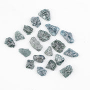 Raw rough diamonds and blue uncut raw diamond in natural unpolished rough 