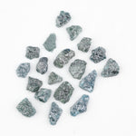 Raw rough diamonds and blue uncut raw diamond in natural unpolished rough 