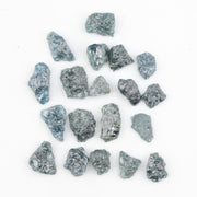 Raw rough diamonds and blue uncut raw diamond in natural unpolished rough 