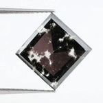 Square cut lab grown diamond with dramatic black and white salt and pepper galaxy inclusions in a geometric cut, showcasing a unique natural-looking pattern ideal for custom engagement rings or statement jewelry.