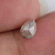 0.69 Ct natural grey brown pear cut diamond with soft earthy tones and elegant teardrop shape for timeless fine jewelry