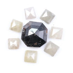 Natural salt and pepper diamond centerpiece with surrounding white and champagne pyramid-cut natural diamonds arranged in a circular layout on a white background.