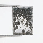 Contemporary lab grown diamond inspired crystal wall art with organic black mineral growth patterns inside a geometric mirrored frame, creating a modern reflective luxury statement piece.