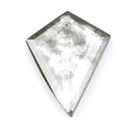 Kite-cut lab grown diamond with natural-style internal inclusions, geometric faceting, and transparent crystal body, photographed on a white background for ethical fine jewelry and custom engagement ring design.