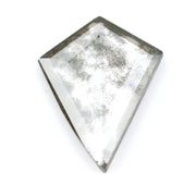 Kite-cut lab grown diamond with natural-style internal inclusions, geometric faceting, and transparent crystal body, photographed on a white background for ethical fine jewelry and custom engagement ring design.