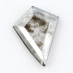 Kite-cut lab grown diamond with natural-style internal inclusions, geometric faceting, and transparent crystal body, photographed on a white background for ethical fine jewelry and custom engagement ring design.
