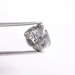 Raw uncut gray diamond showing natural crystal structure
