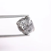 Raw uncut gray diamond showing natural crystal structure