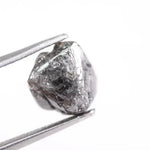 Raw uncut gray diamond showing natural crystal structure