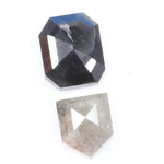 Natural black octagon-cut diamond and shield-cut salt-and-pepper diamond displayed on white background, showing unique inclusions and rustic faceting details.