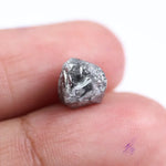 Raw uncut gray diamond showing natural crystal structure