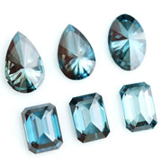 Blue lab created diamond fancy cut collection including pear, oval and emerald loose CVD diamonds for custom rings, earrings, pendants and fine jewelry making with eco friendly sustainable diamonds.